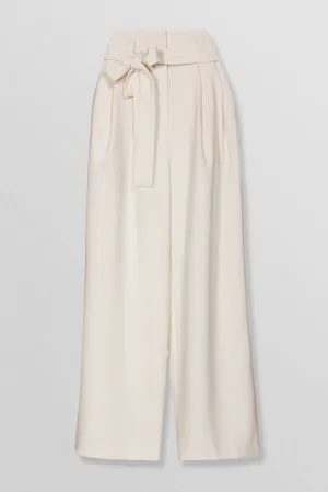 Belted cotton wide leg pleated pants in cream