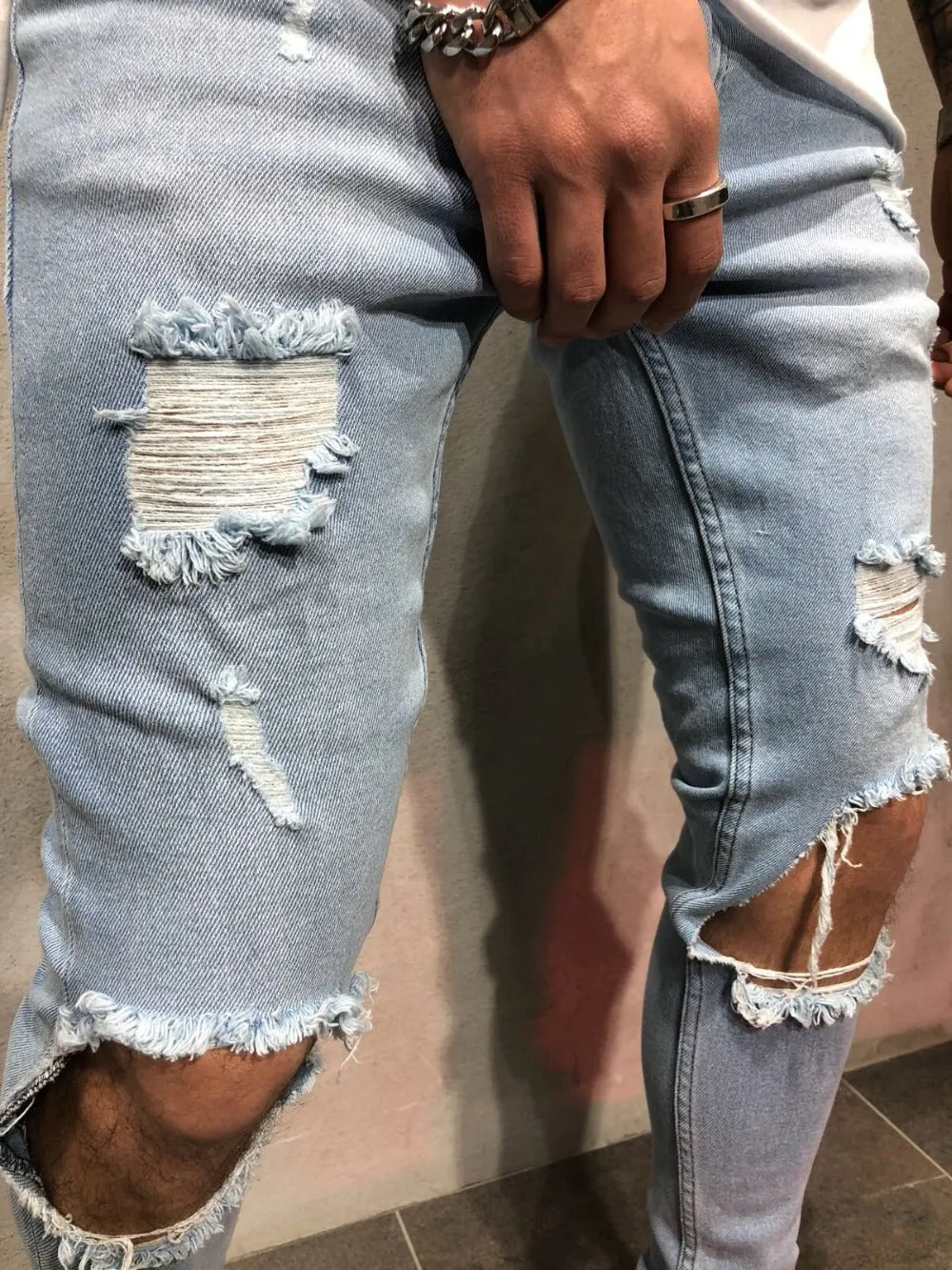 Blue Ripped Knee Out Skinny Jeans