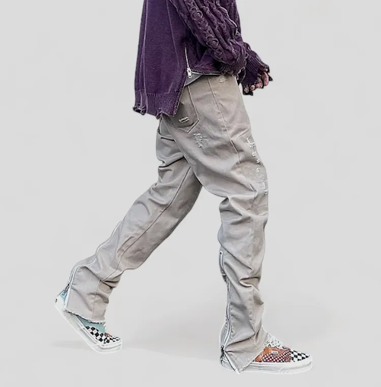 Slim fit distressed jean with back leg zipper