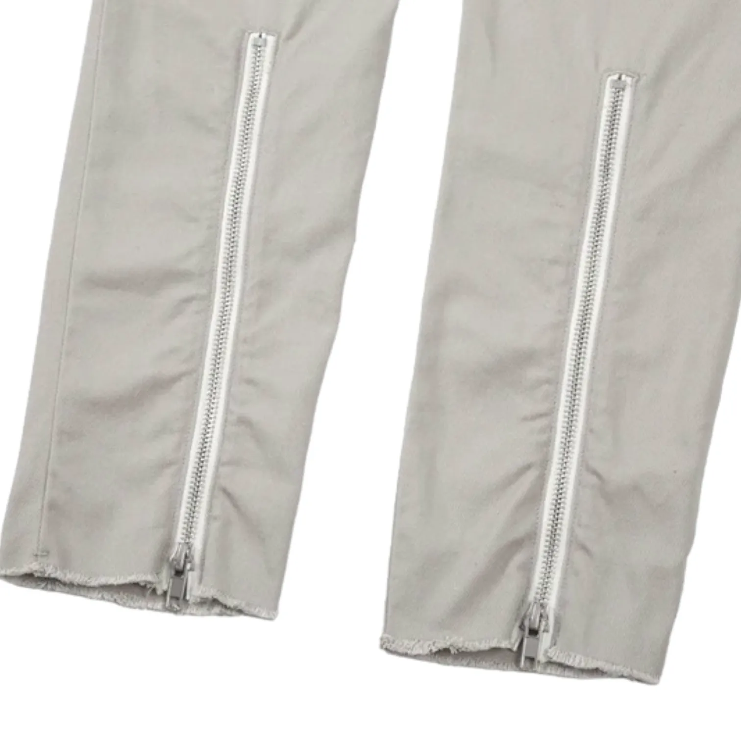 Slim fit distressed jean with back leg zipper