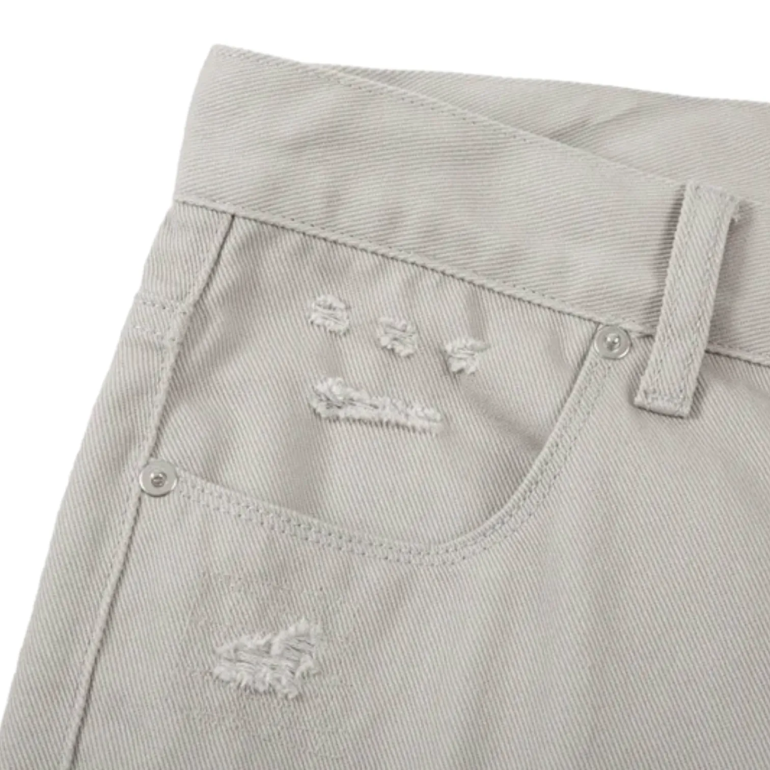Slim fit distressed jean with back leg zipper