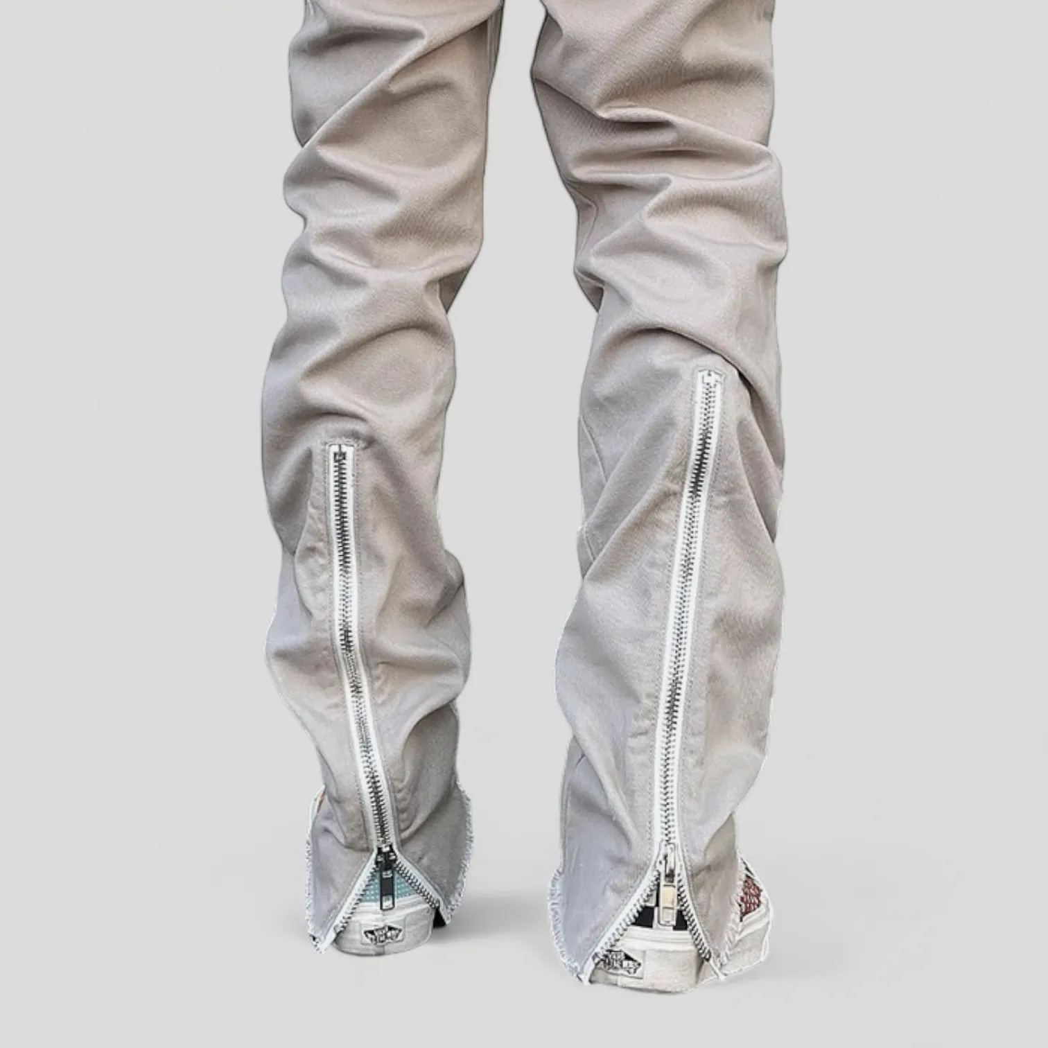 Slim fit distressed jean with back leg zipper
