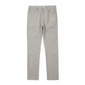 Slim fit distressed jean with back leg zipper